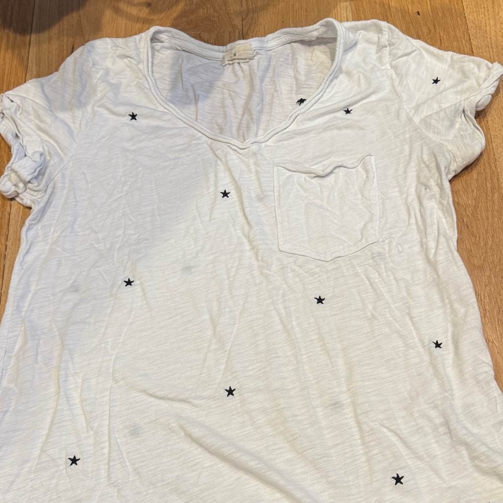 T.La White Tee with Black Star Accents